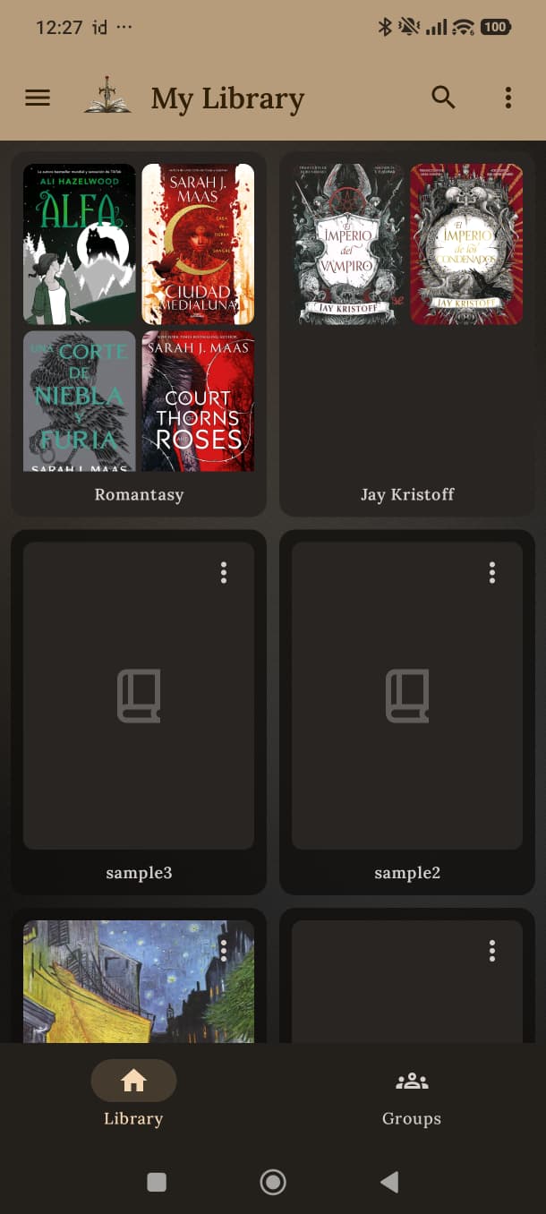 The Shelves library screen, with covers grouped into Romantasy and Jay Kristoff collections